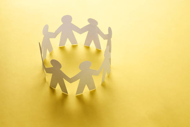 istock Paper people standing together in circle. Team, business teamwork, global connection concept. 1227049082