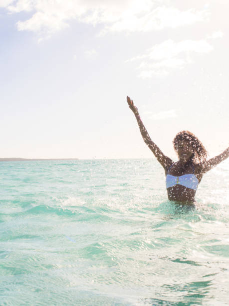 istock Woman splashing water with both hands 1227051453