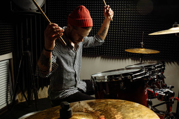istock energetic professional drummer play on drums 1227051721