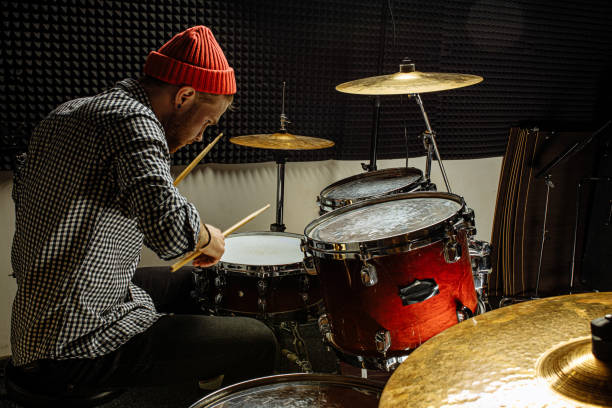 istock young talented man emotionally play the drums 1227051857