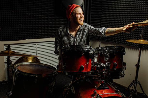 istock young talented man emotionally play the drums 1227051858