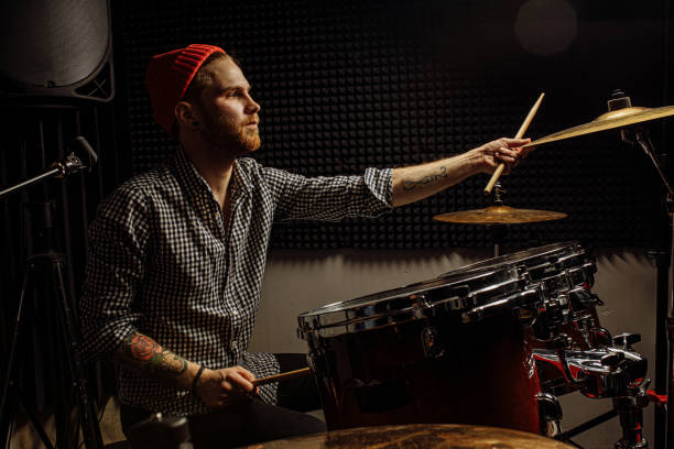 istock young talented man emotionally play the drums 1227052175