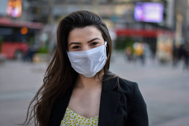 istock Woman smilling behind the mask 1227057501