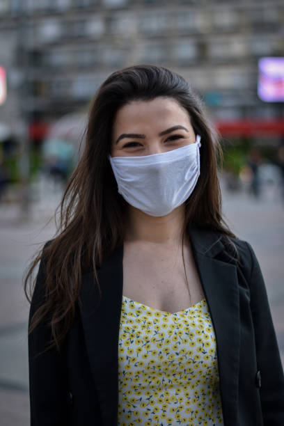 istock Woman smilling behind the mask 1227057518