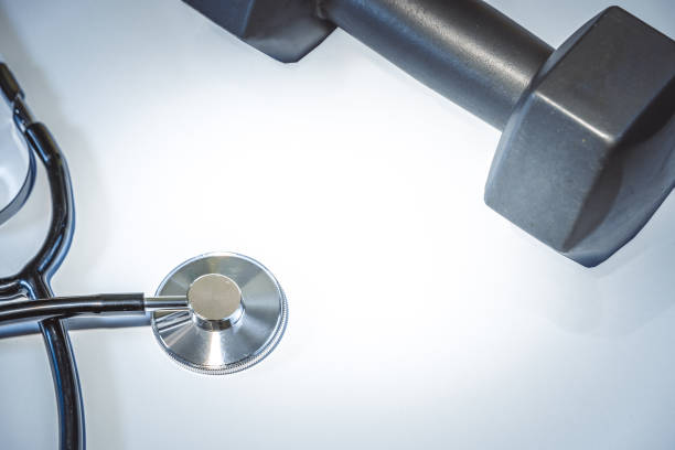 istock Dumbbell and stethoscope stock photo 1227059124