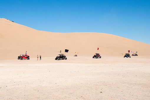 Little Sahara Recreation Area, Utah, USA - May 25, 2020: A collection of off road vehicles prepares to scale the sorrounding sand dunes during the Memorial Day weekend at Little Sahara.