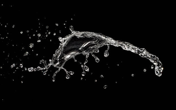 water splash isolated on black background water splash isolated on black background splashing droplet stock pictures, royalty-free photos & images