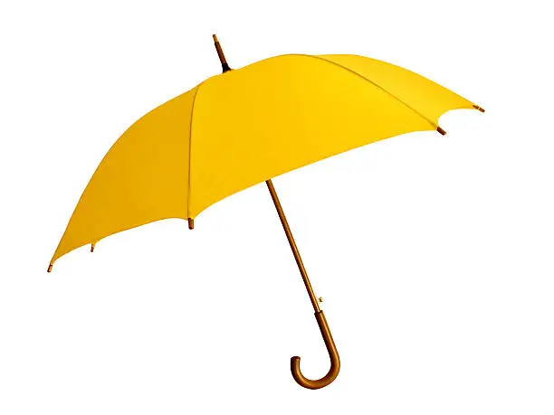 Photo of Opened yellow umbrella with brown handle on white background