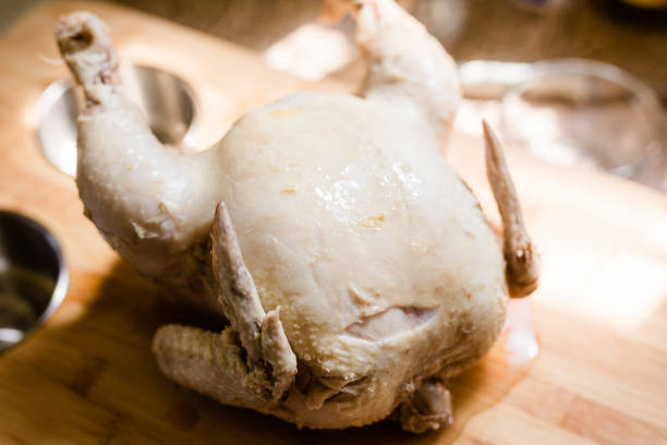 istock Poached Whole Chicken on a Wood Cutting Board. 1227065110