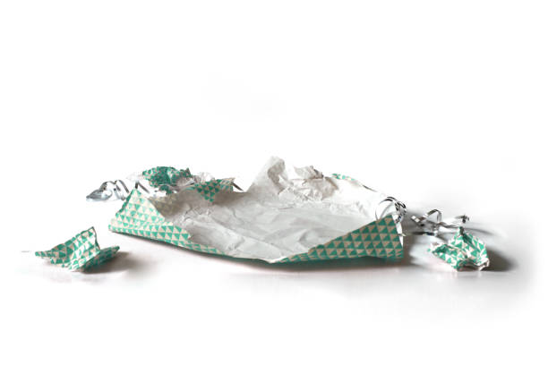 istock Unwrapped Crumpled Gift Wrap Teal Isolated on White 1227068229