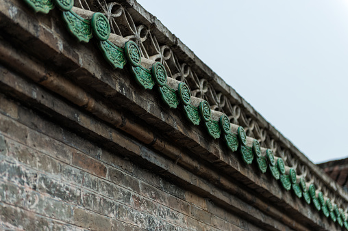 Chinese Eaves with Taoism icon in Chinese village, Yangshuo, Guilin.
