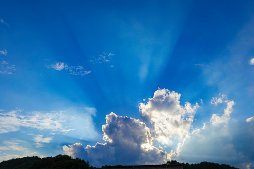 Blue sky with cloud and sun ray light for natural background.