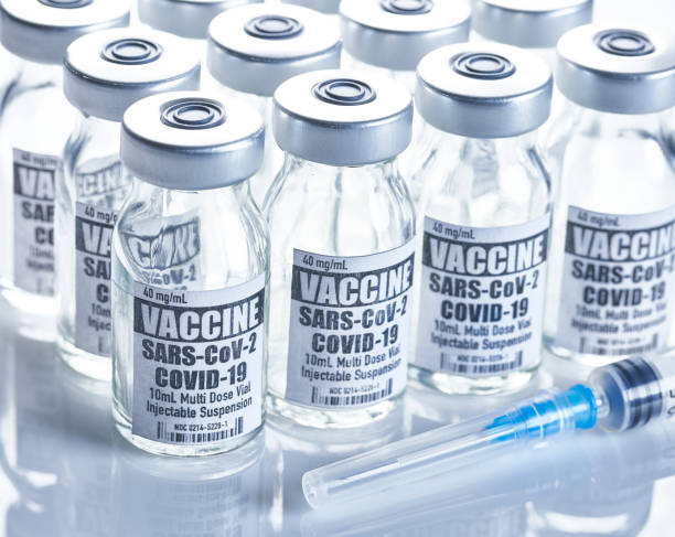 istock Vaccine: Covid-19, Coronavirus in vial with syringe on white background 1227079400