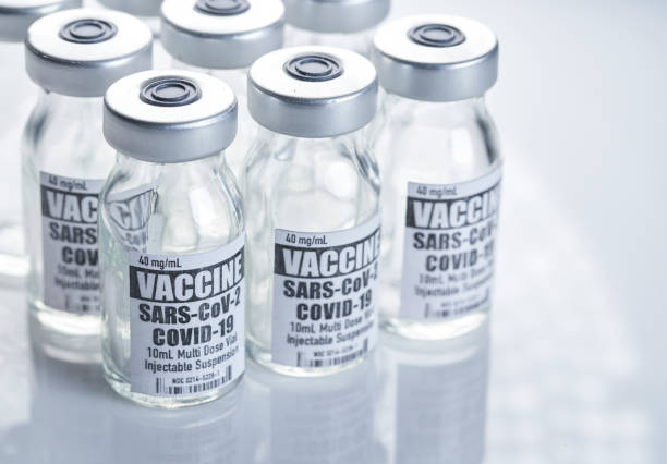 istock Vaccine: Covid-19, Coronavirus in vials with syringe on white background 1227080315