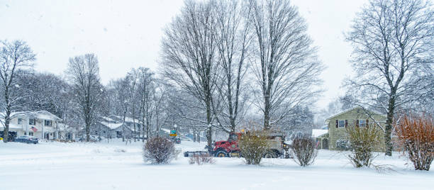 istock Winter Blizzard Snow Plow Truck Working Residential District 1227082350