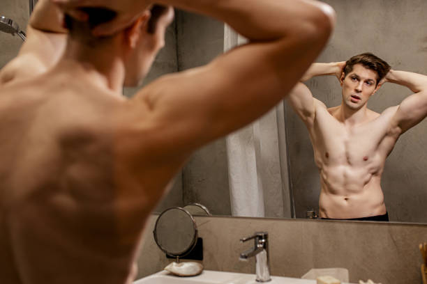 istock attractive man with perfect body in bathroom 1227082932