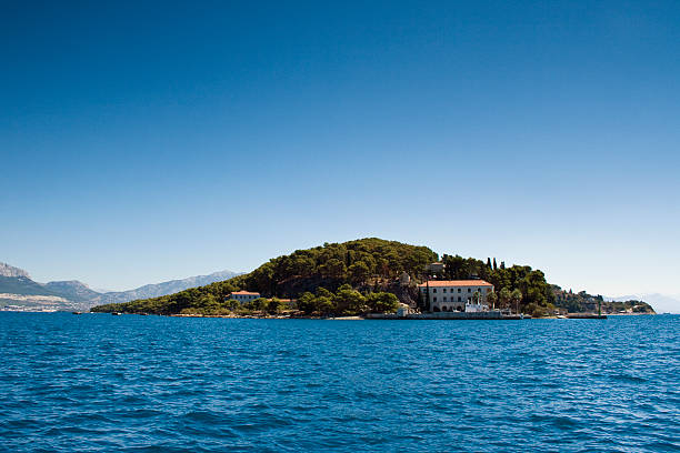 Alexandria, USA - May 27, 2013: Boldt Castle is a major landmark and tourist attraction in the Thousand Islands region of the U.S. state of New York. It is located on Heart Island in the Saint Lawrence River. Heart Island is part of the Town of Alexandria, in Jefferson County.