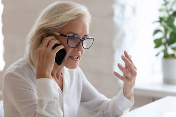 istock Angry middle-aged employee have unpleasant smartphone call 1227089111
