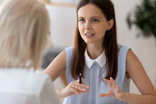 istock Confident female employer interview candidate at meeting 1227089190
