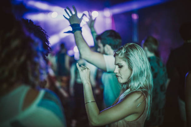 istock Dancing on music festival at night! 1227089366
