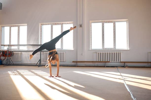 istock Young girl engaged art gymnastic 1227093588