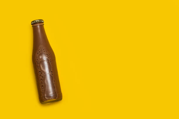 istock A bottle of chocolate milk on a yellow background 1227096450