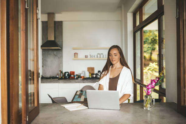 istock Woman working from home at the computer 1227096890