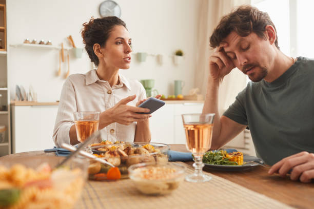 istock Woman talking to man during dinner 1227100582