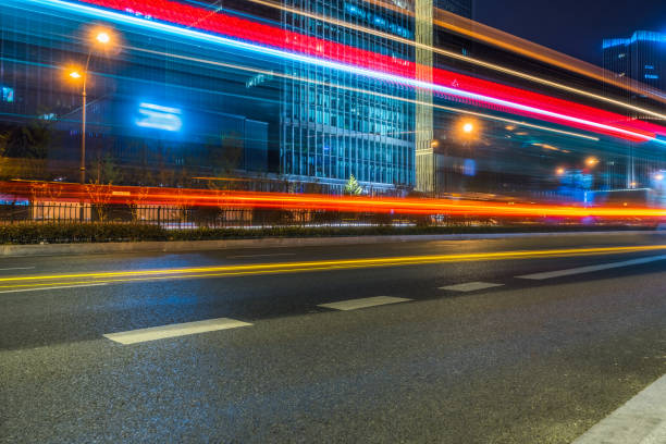 istock Vehicle light trails in city at night 1227101138