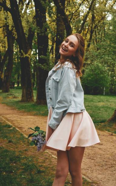 istock Girl with dandelion 1227102710