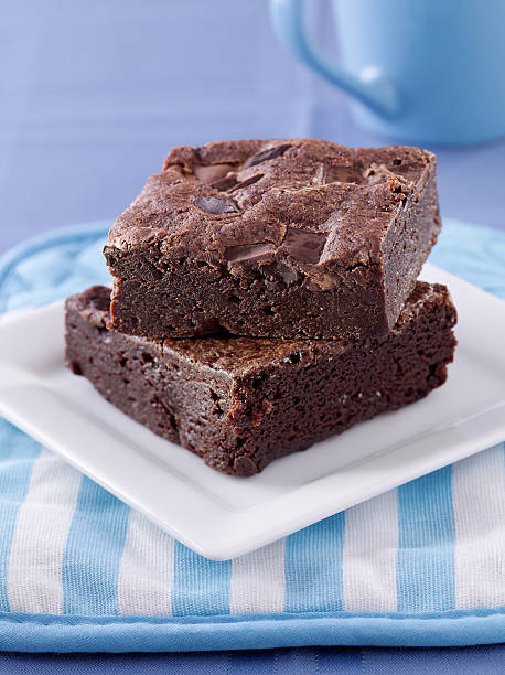 istock chocolate brownies stacked on a plate. 122710576