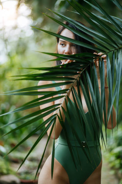 istock young beautiful woman in forest 1227105833