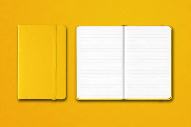 Yellow closed and open lined notebooks isolated on colorful background Yellow closed and open lined notebooks mockup isolated on colorful background moleskin stock pictures, royalty-free photos & images