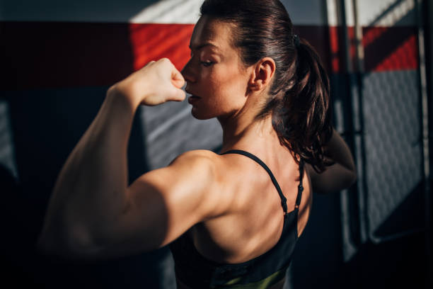 istock Beautiful strong woman in gym 1227106641