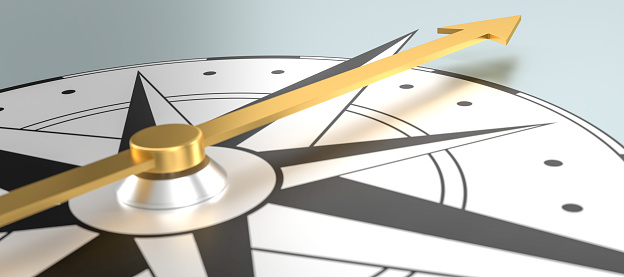 Compass with a golden compass needle - 3d rendering
