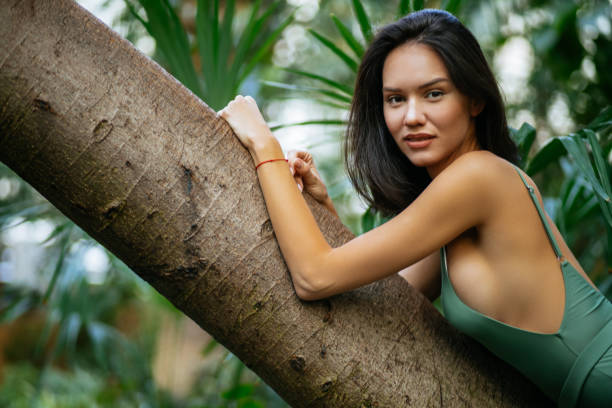 istock young caucasian slender model in tropical rainforest 1227106827