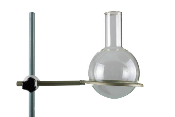 Chemical round-bottom flask mounted on a stand isolated on a white background, Close up.