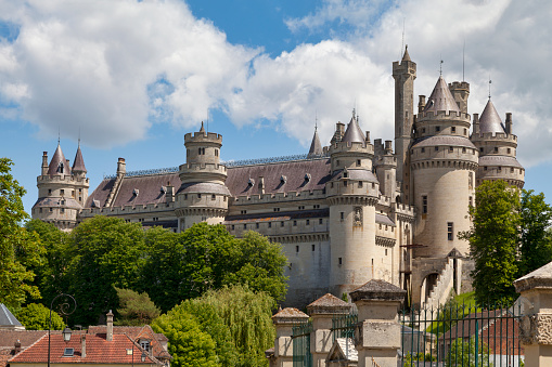 Pierrefonds, France - May 25 2020: The Pierrefonds Castle is an imposing castle located in the Oise department, in the Hauts-de-France region, on the south-eastern edge of the Compiègne forest.