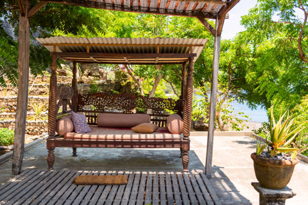 istock Beautiful vintage bench. Outside asian style interior. 1227109582