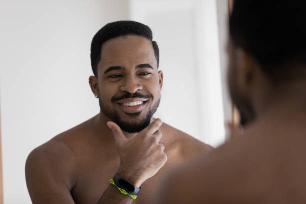 istock Smiling biracial man get ready in home bathroom 1227113089