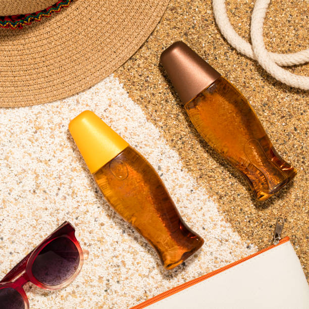 istock Beach accessories isolated on sand background 1227117823