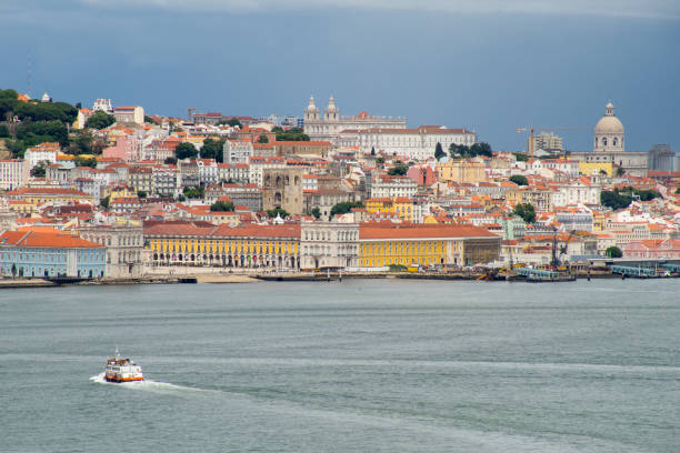 istock moving boat crossing the Tejo river. 1227120063