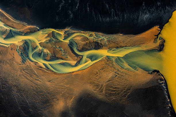 istock Iceland glacial river flowing into the sea, captured by a drone 1227120526