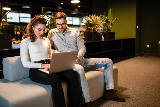 istock Successful young web designers brainstorming new ideas for a job project 1227122070