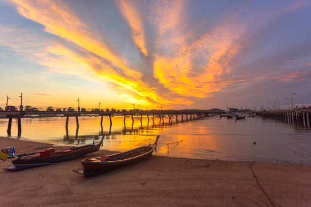 istock beautiful sunrise at Chalong pier 1227122111