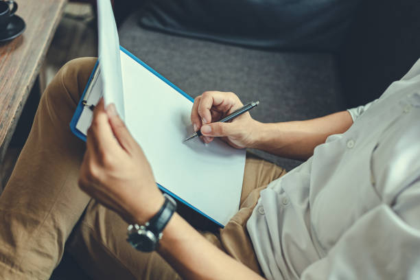 istock Businessman hold pen and working.  Business office concept. 1227132086