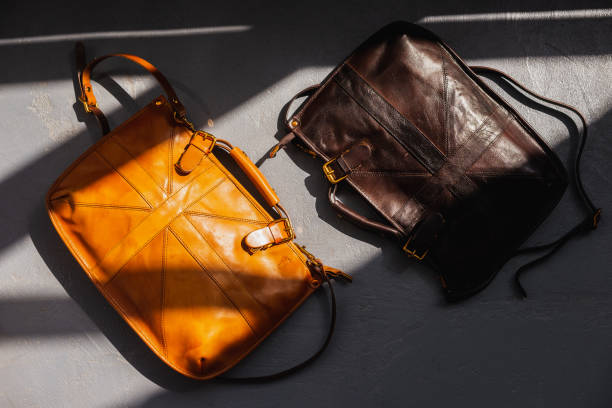 istock Yellow and black leather bags on floor 1227136766