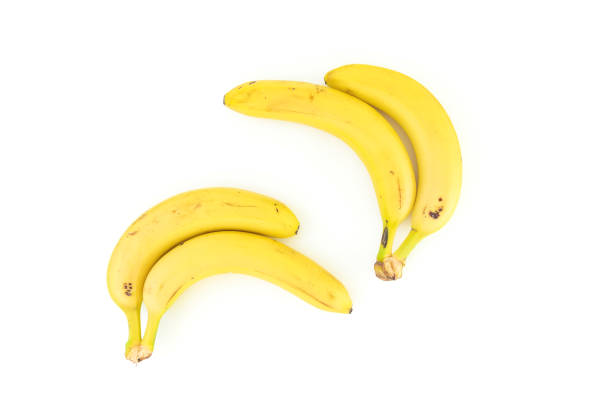 istock Banana isolated on white background. Flat lay. Top view. Summer concept with bananas 1227136907