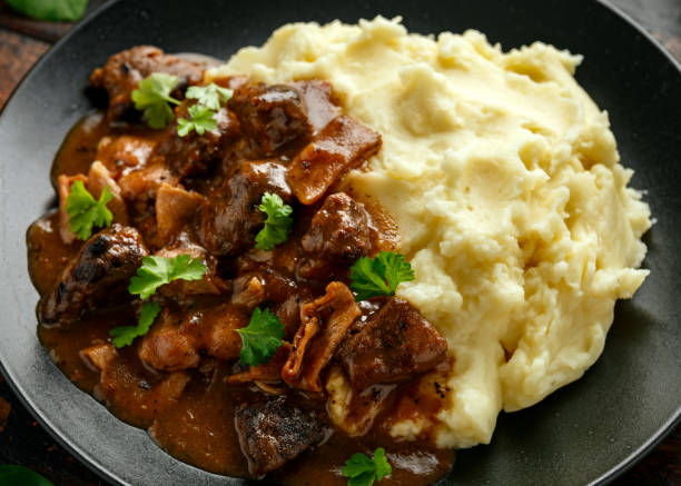 istock Fried Liver, bacon in onion gravy with mashed potato 1227139069