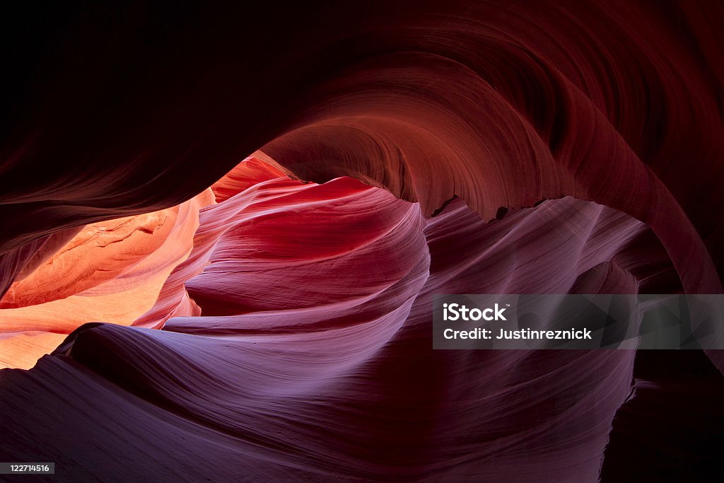Lower Antelope Canyon Incredible bounce light in the depths of Lower Antelope Canyon, Page, Arizona. Abstract Stock Photo